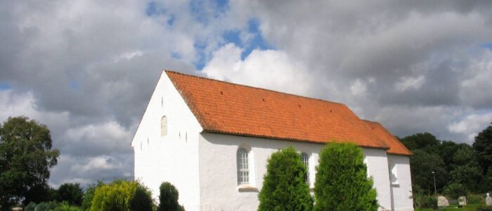 Tolne kirke Foto: Tolne kirke Public Domain, https://commons.wikimedia.org/w/index.php?curid=593742